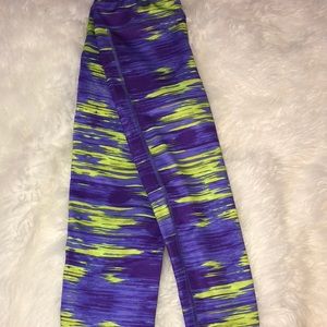 Green and purple yoga pants